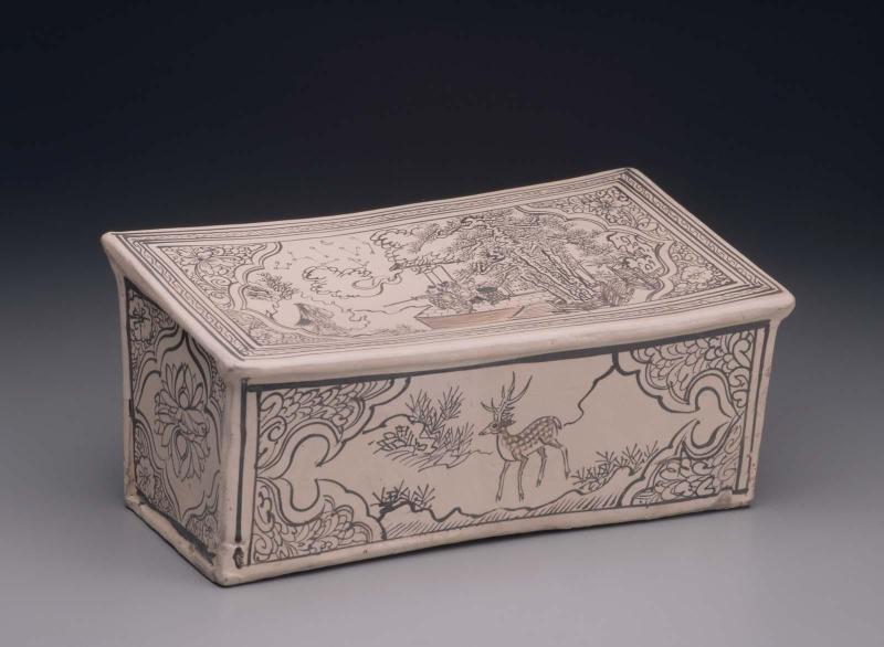 Rectangular pillow with decoration of sword-wielding figure confronting female spirit under constellation of stars and moon