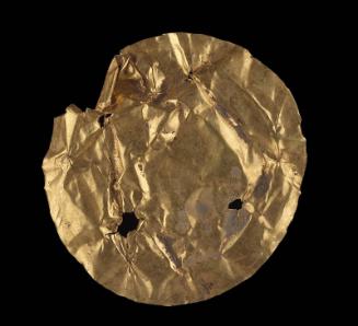 Embossed gold disk