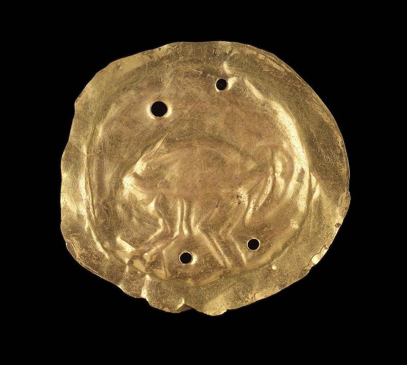 Embossed gold disk