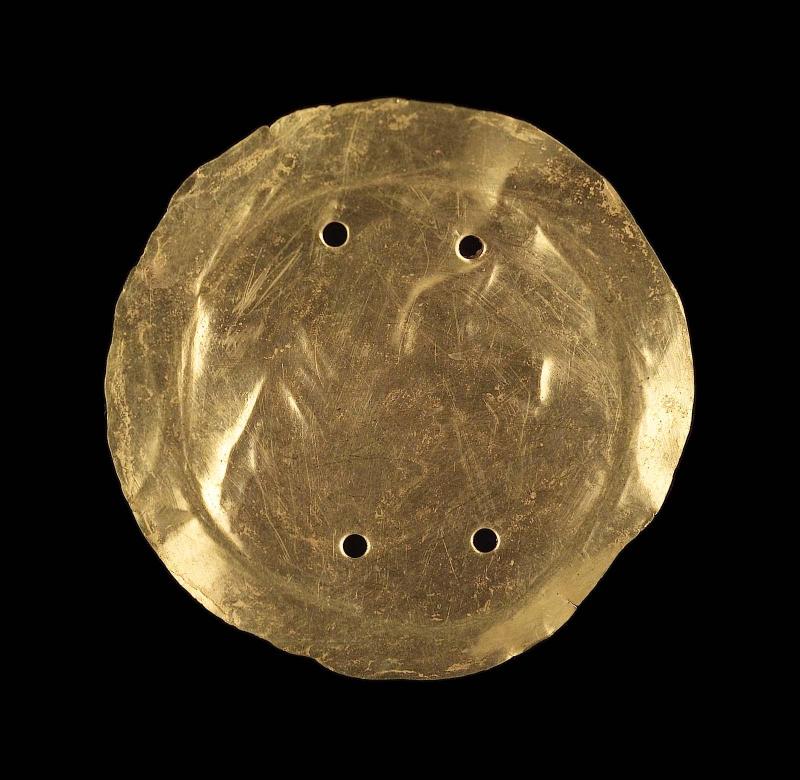 Embossed gold disk