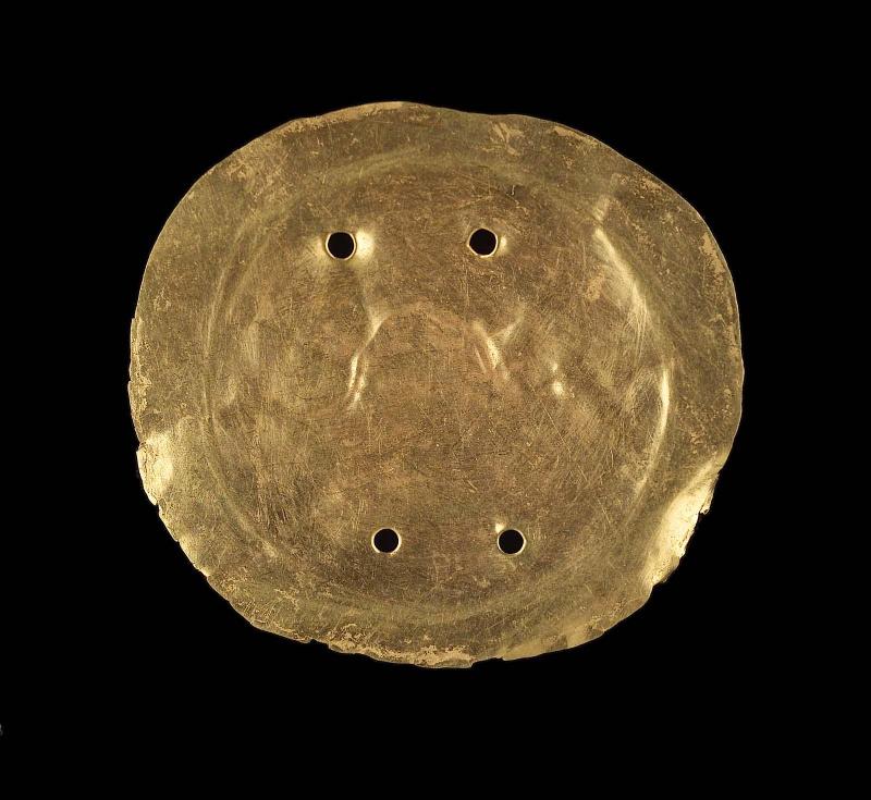 Embossed gold disk