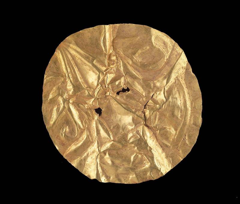 Embossed gold disk