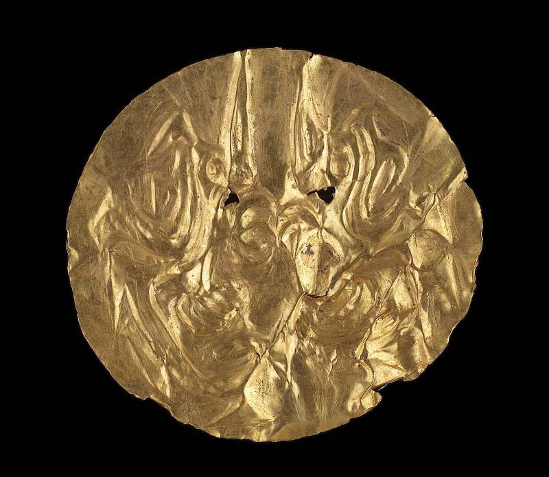Embossed gold disk