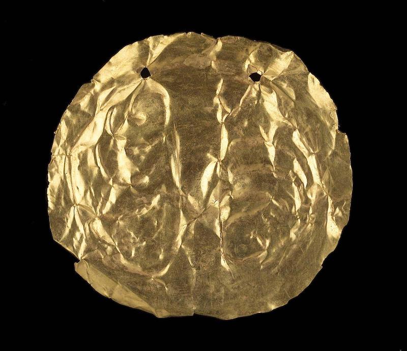 Embossed gold disk