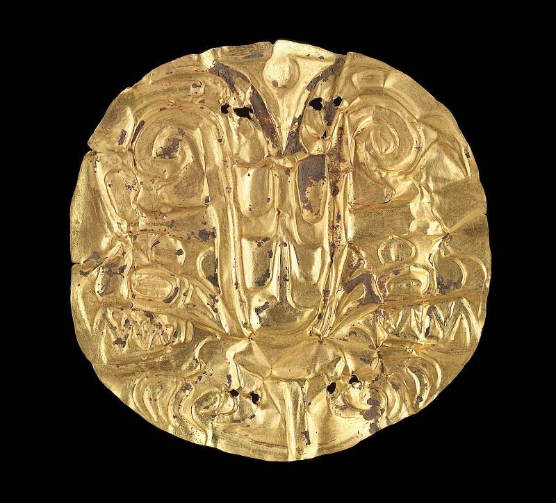 Embossed gold disk