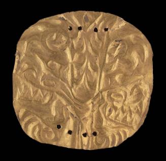 Embossed gold disk