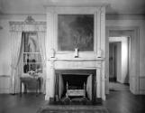 Wall with fireplace and painting