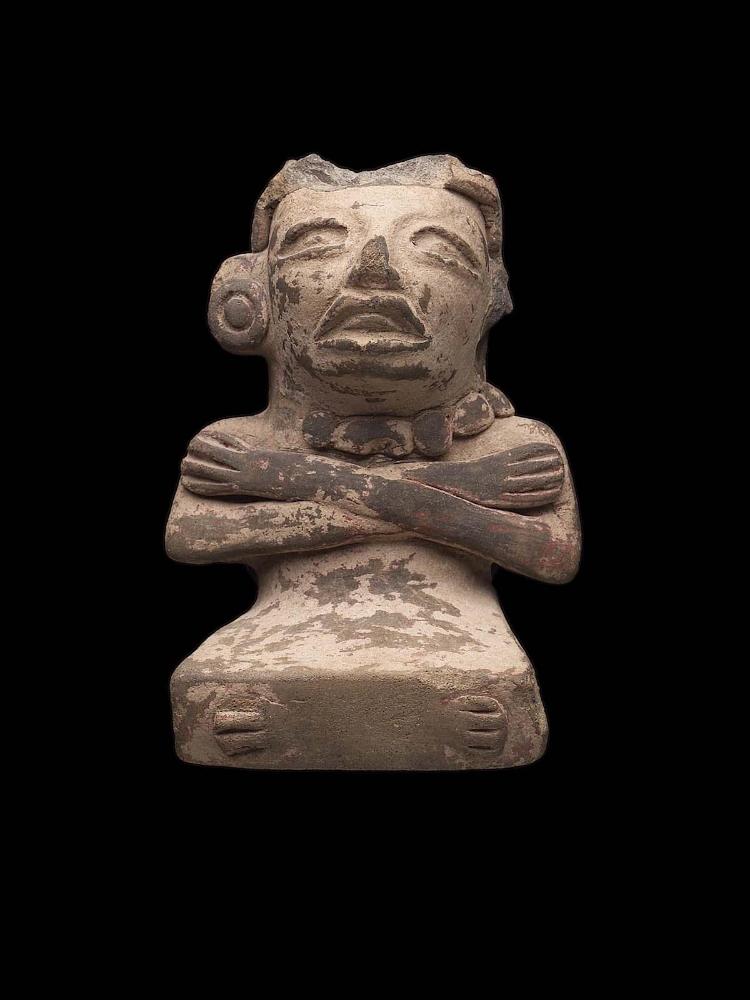 Seated human effigy urn