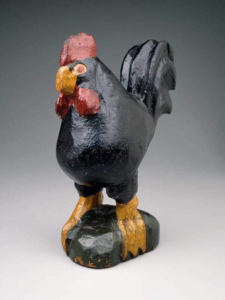 Rooster on a hummock