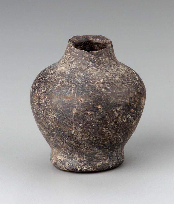 Globular jar with tall neck