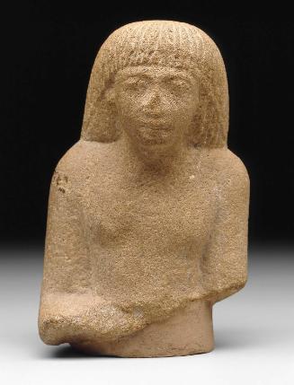 Upper part of a seated male figure