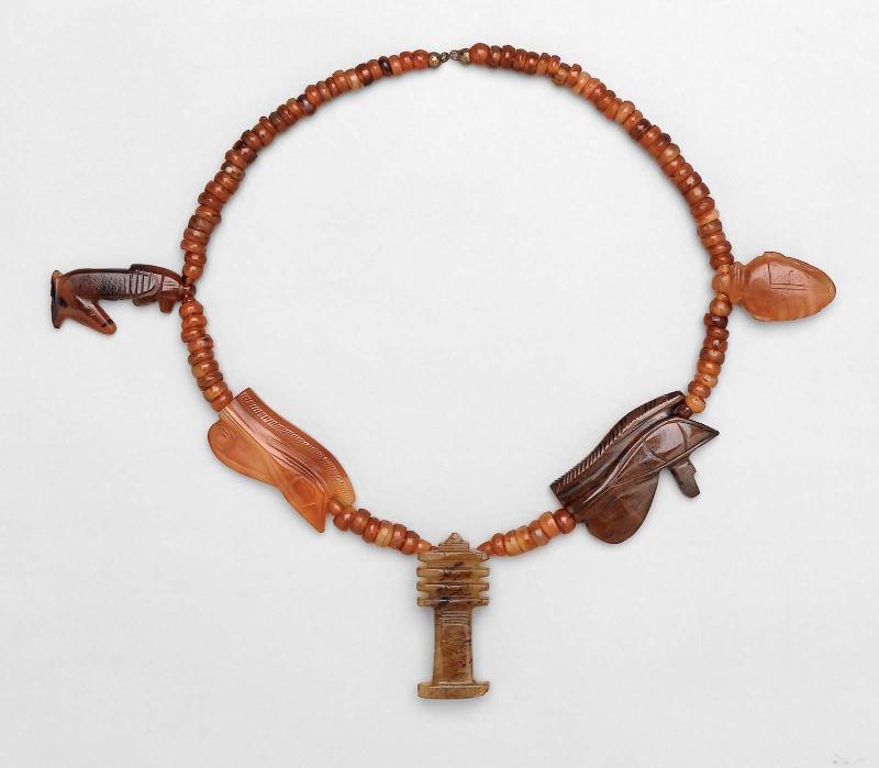 String of amulets and truncated ball beads