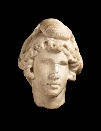 Youth in an eastern cap