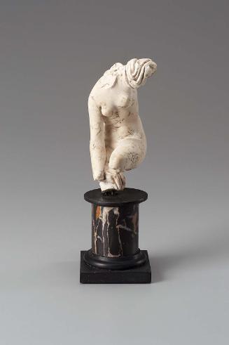 Aphrodite untying her sandal