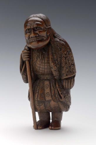 Kyogen figure wearing a mask