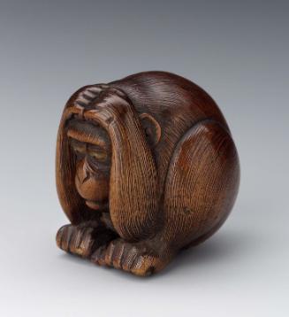 Crouching monkey