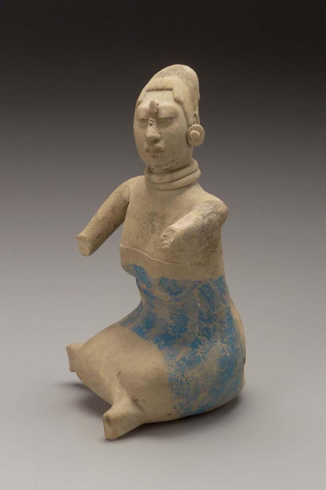 Seated female effigy whistle