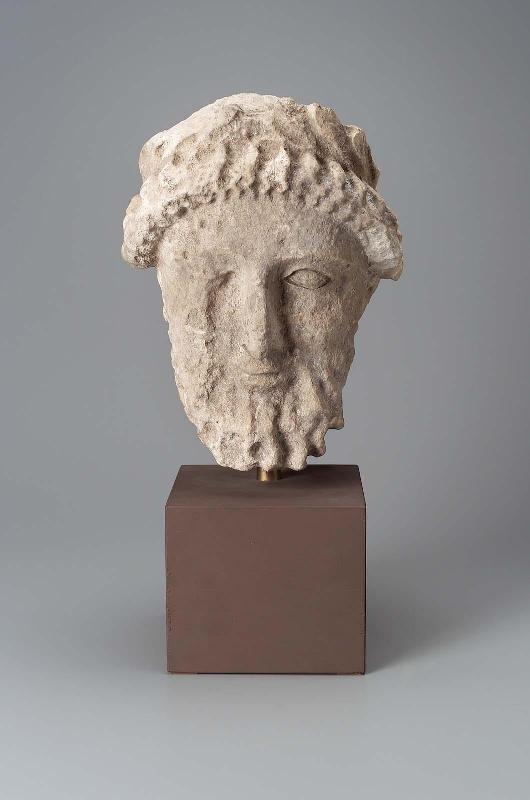 Bearded head with wreath of leaves and flower buds