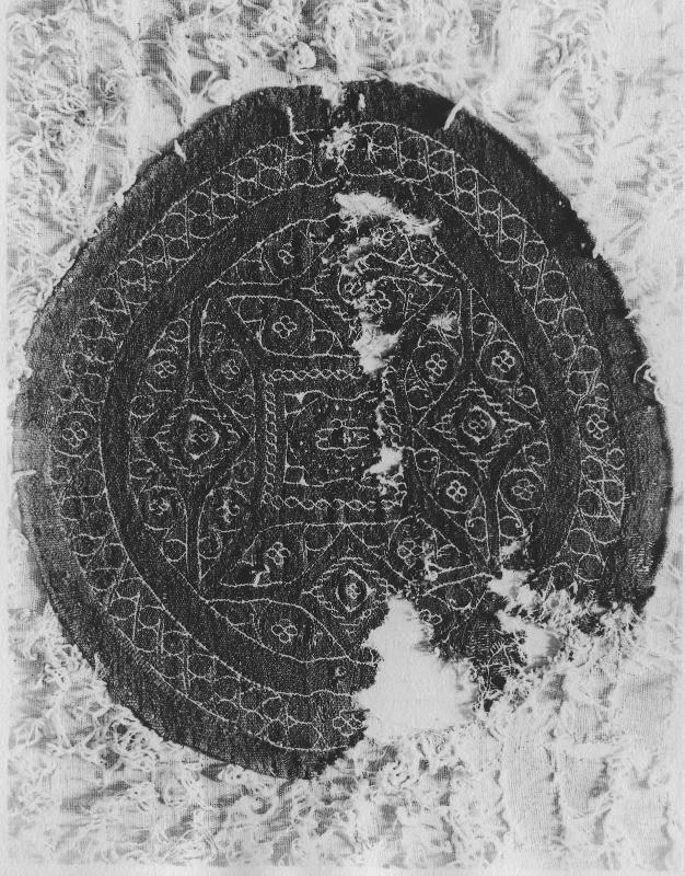 Fragment of a circular medallion on a looped pile cloth