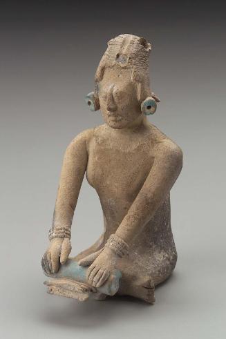 Jaina-style female effigy figure