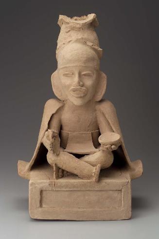 Seated human effigy