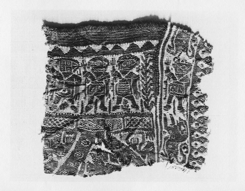 Fragment of the neck of a garment