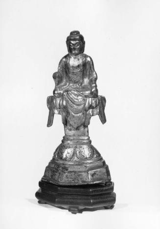 Seated Buddha on lotus throne
