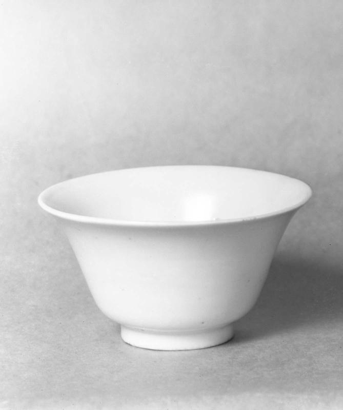 Molded bowl with relief designs under qingbai glaze