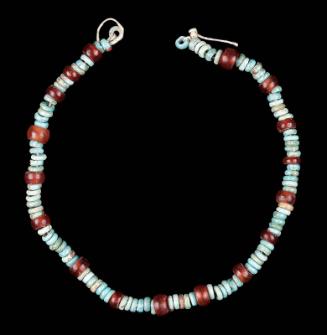 String of carnelian and faience disc beads