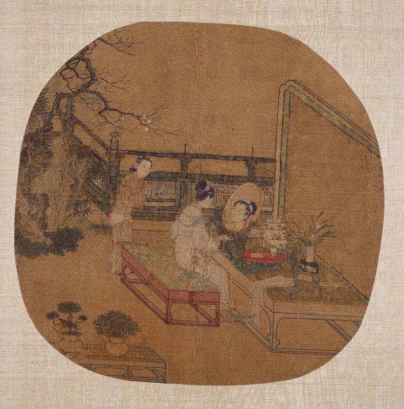 Lady at her dressing table in a garden