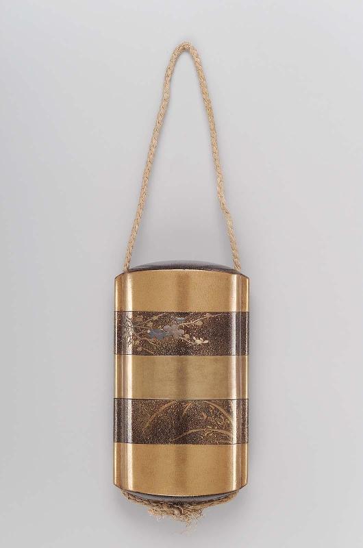 Four-case inro with design of plum, bamboo, chrysanthemums and grasses
