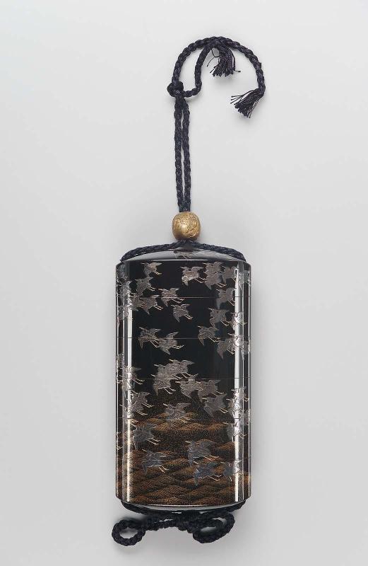 Five-case inro with design of cranes and waves