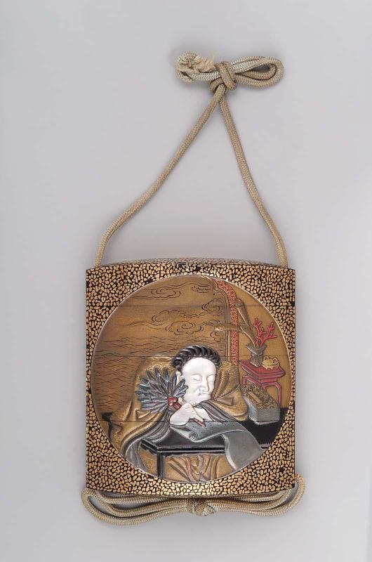 Three-case inro with roundel design of a Chinese scholar asleep while writing a scroll