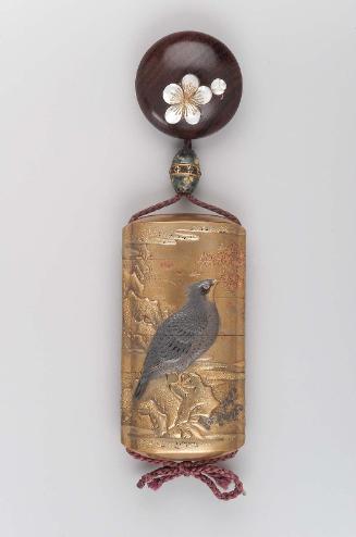 Manju netsuke with cherry-blossom design