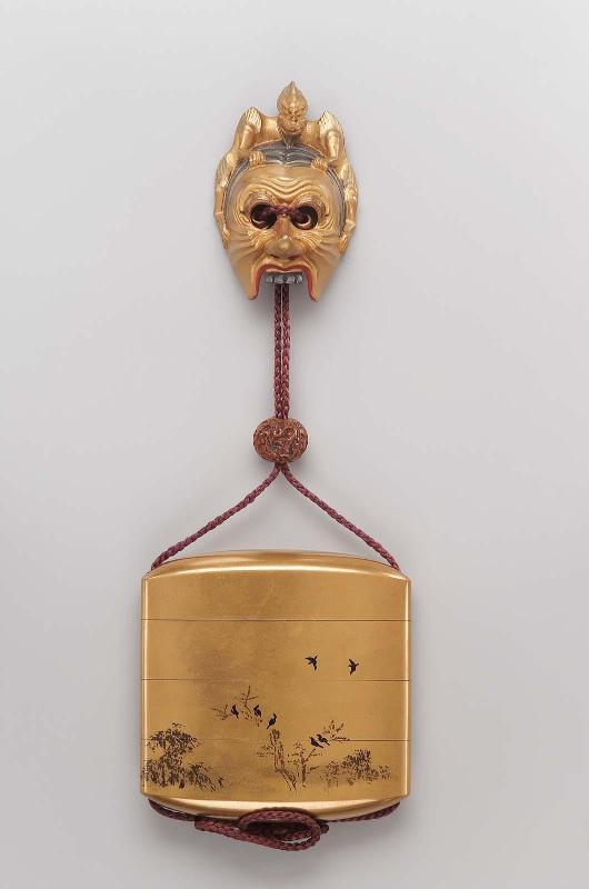Netsuke in the form of a mask for the Ranryo-o dance