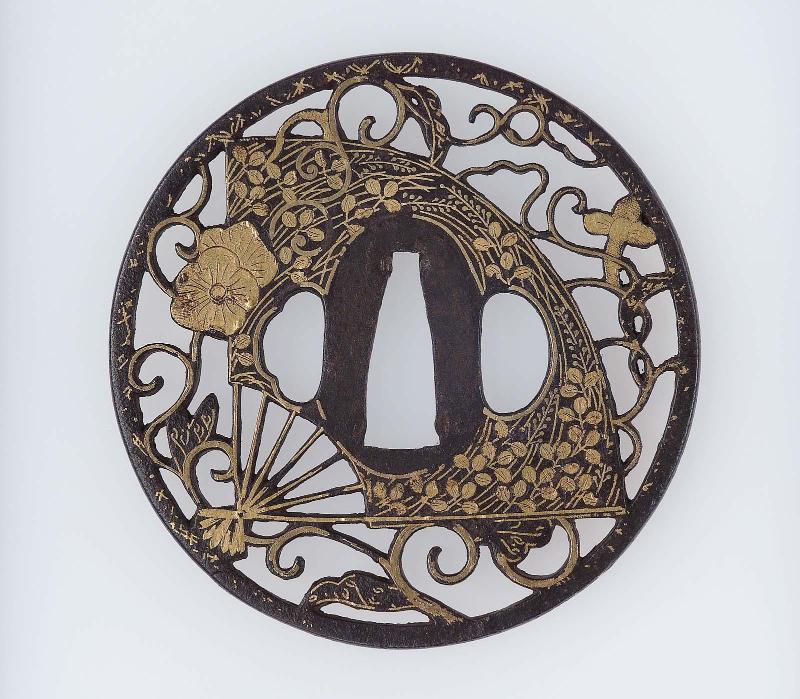 Tsuba with design of fan, cloves and blossom
