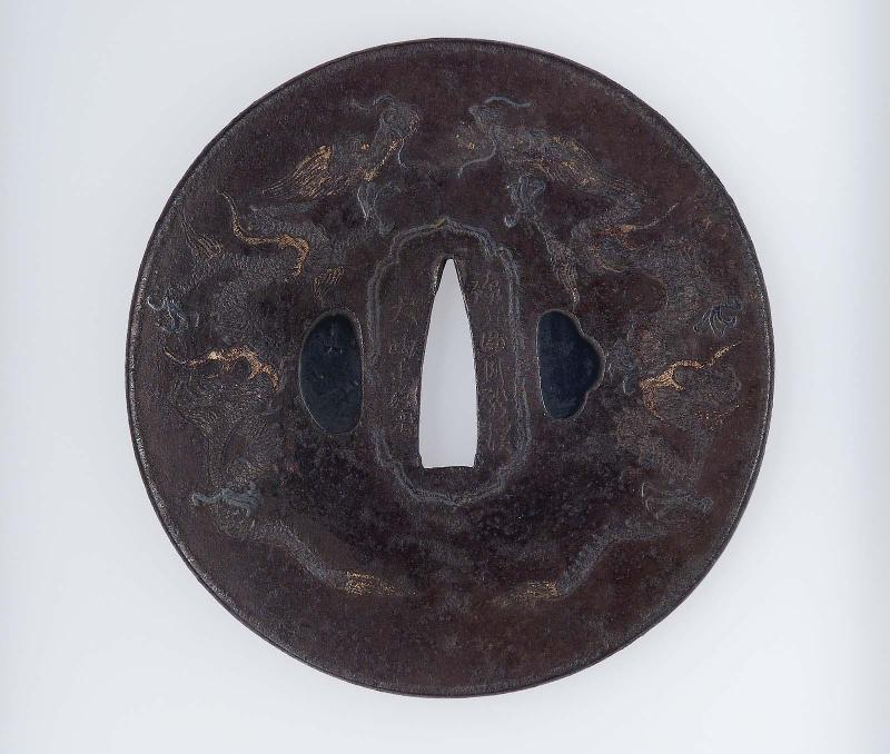 Tsuba with design of dragons and clouds