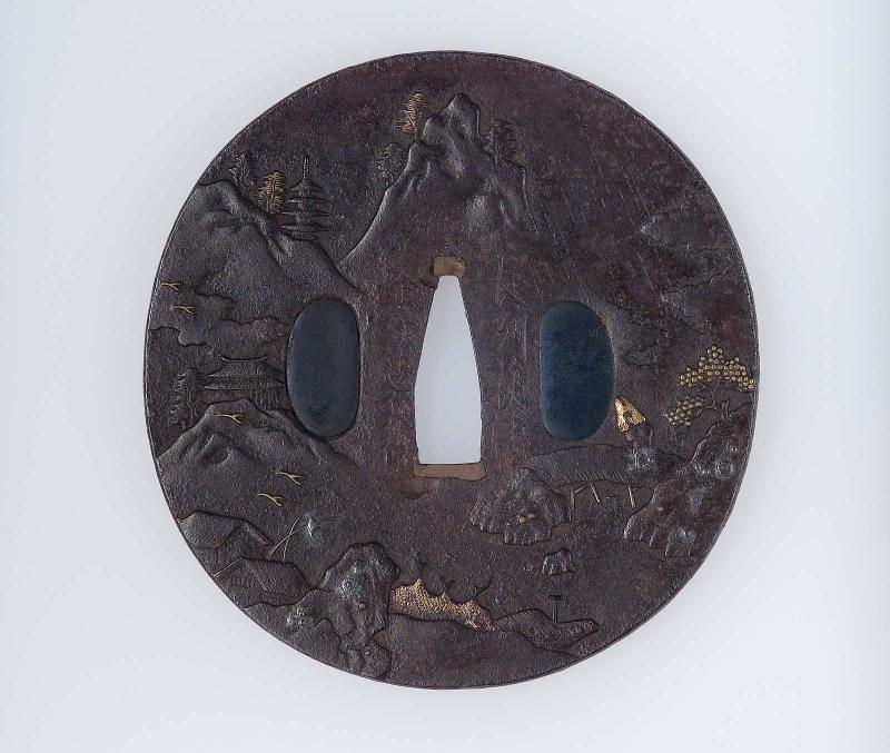 Tsuba with design of landscape with pavilions, pagodas, rocks and figure crossing a bridge