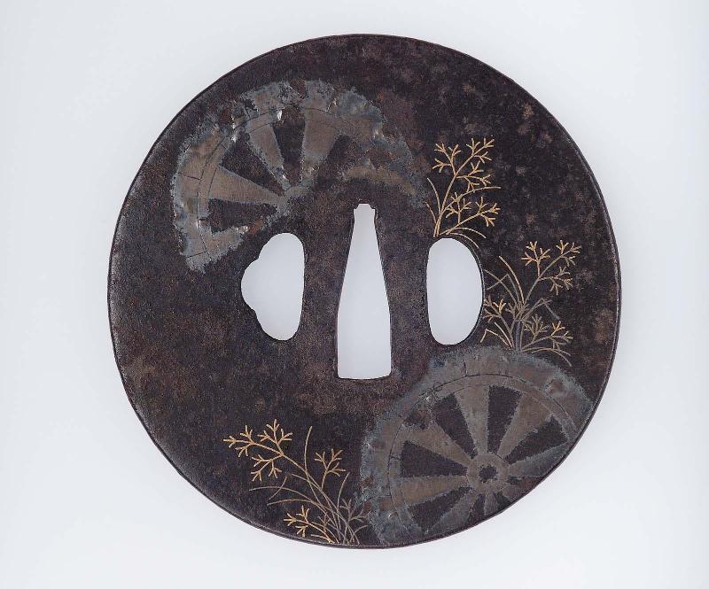Tsuba with design of waterwheels and ferns