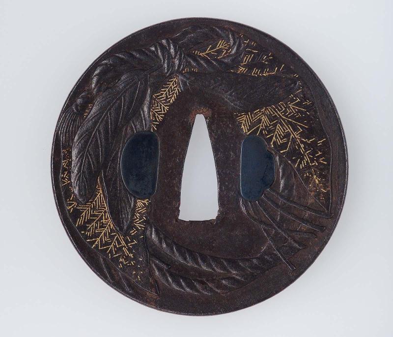 Tsuba with design of leaves and ropes (New Year decoration)