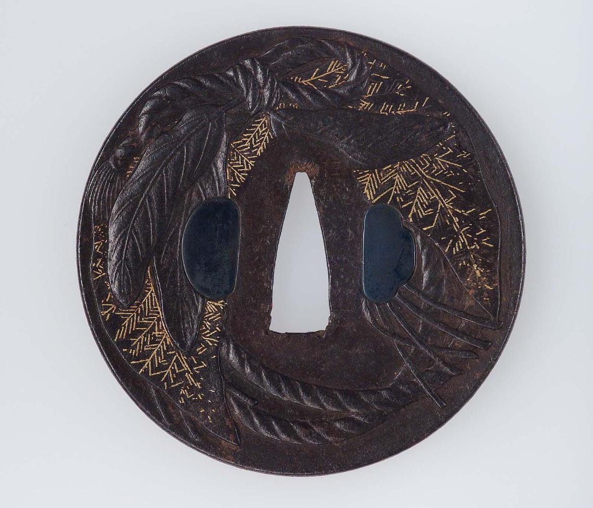 Tsuba with design of leaves and ropes (New Year decoration)
