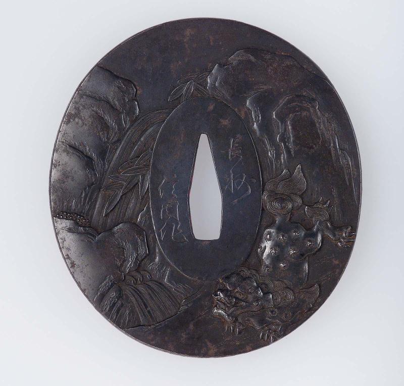 Tsuba with design of shishi by a mountain freshet