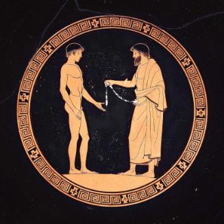 Drinking cup (kylix) depicting victorious athletes and judges