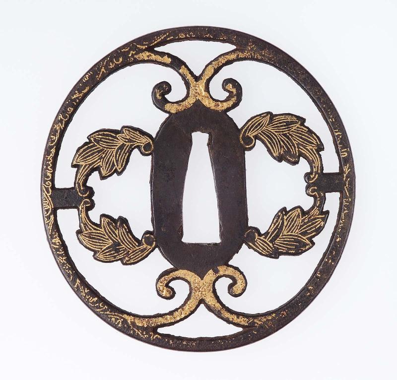 Tsuba with design of daki-myoga