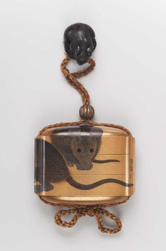 Netsuke in the form of rat crouching and holding its tail