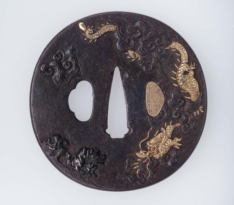 Tsuba with design of dragon, tiger and clouds
