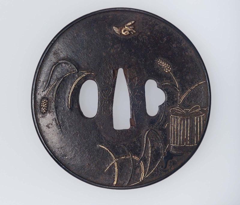 Tsuba with design of millet, bird and bird-cage