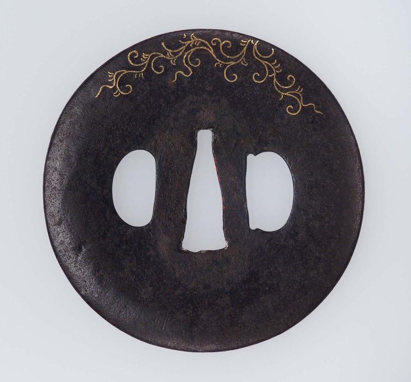 Tsuba with karakusa designs