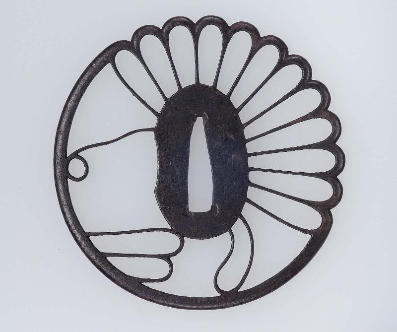 Tsuba with design of chrysanthemum and stream