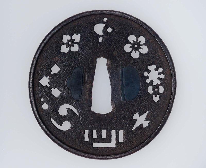 Tsuba with design of takaramono, Genji-mon and flowers